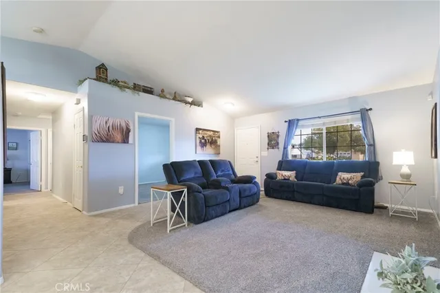 a living room with furniture and a couch