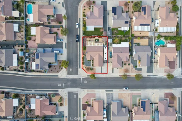 a view of the shops in a street