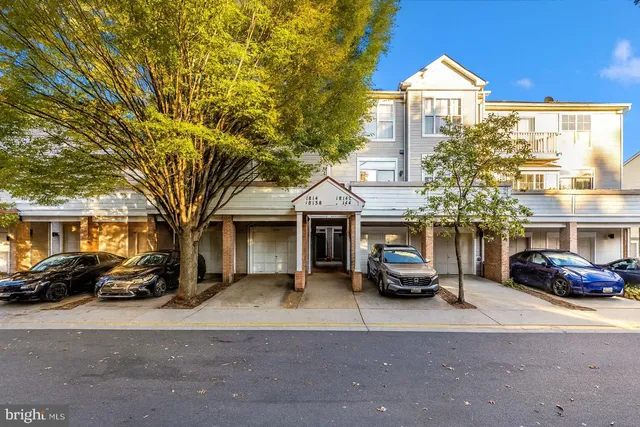 a view of a car park in front of house
