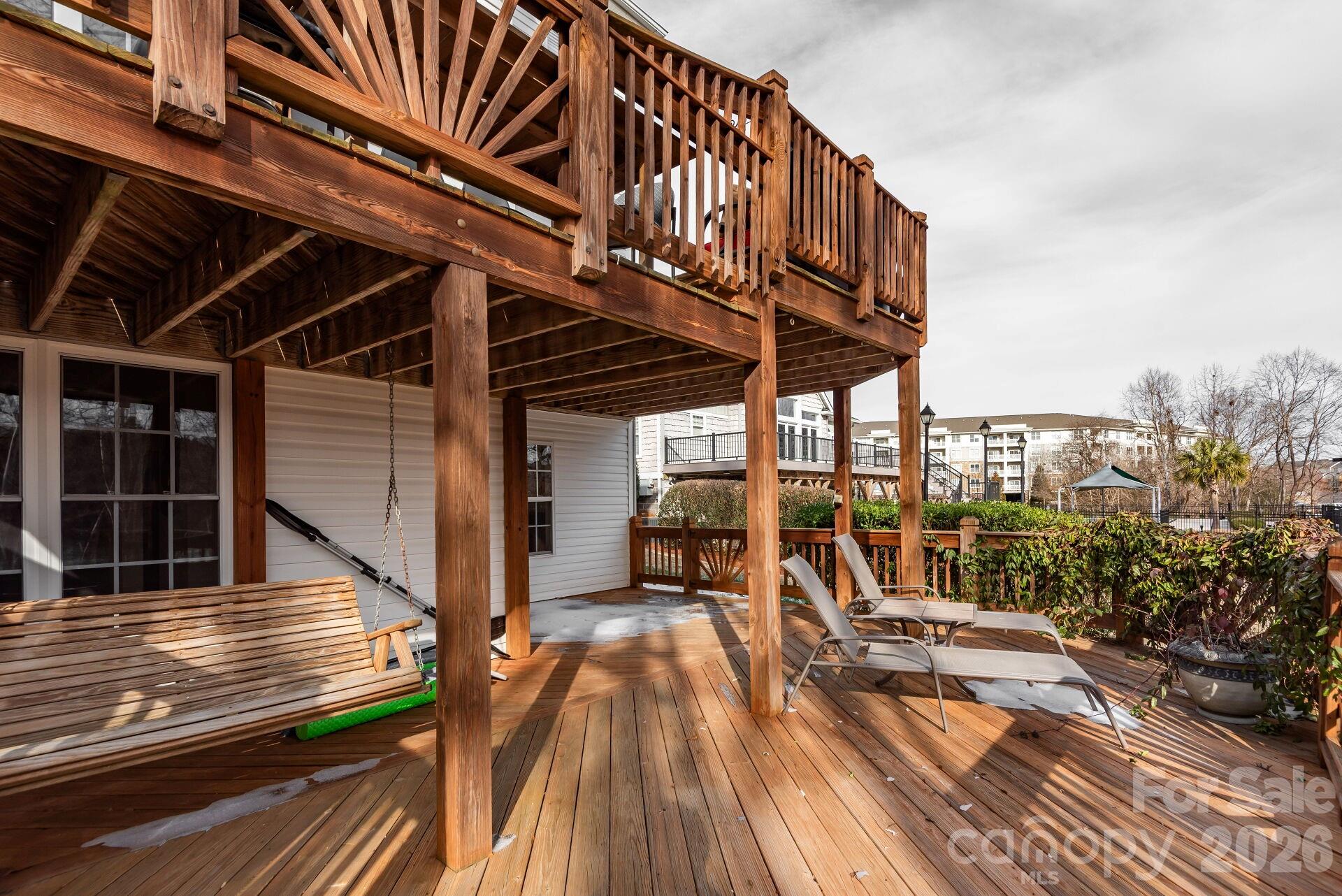 156 Lighthouse Road Mount Holly, NC 28120 - Photo 33 of 39 a view of a patio with a table and chairs