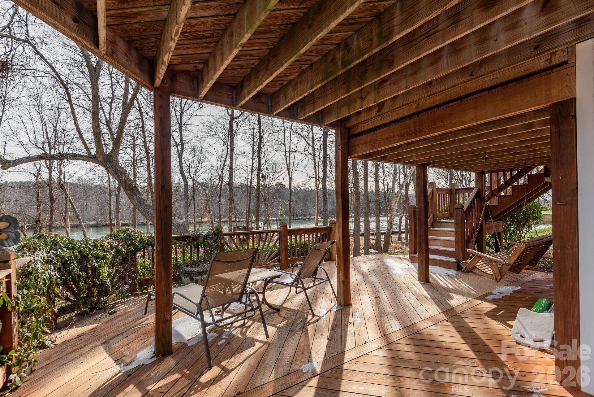 156 Lighthouse Road Mount Holly, NC 28120 - Photo 38 of 39 a building outdoor space with patio furniture and potted plants