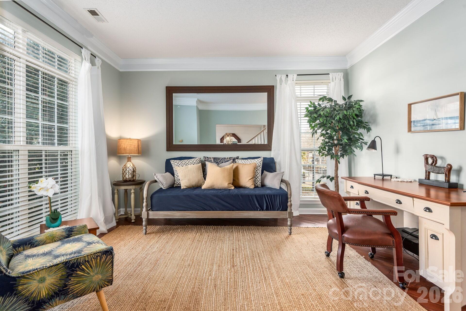 156 Lighthouse Road Mount Holly, NC 28120 - Photo 4 of 39 a bedroom with furniture and a potted plant