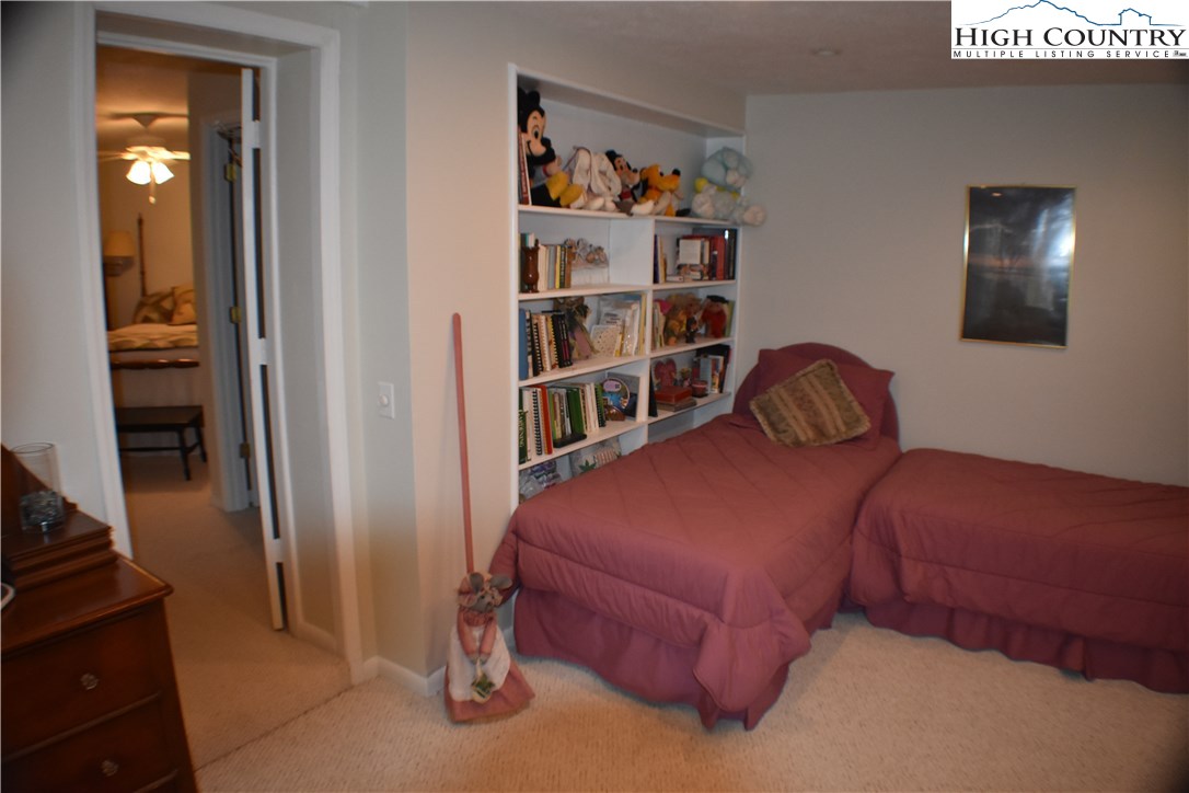 258 Ivy Road Newland, NC 28657 - Photo 26 of 26 a bedroom with a bed and closet