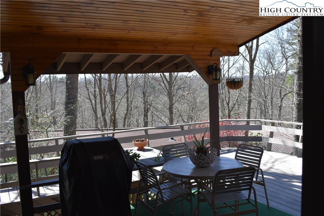 258 Ivy Road Newland, NC 28657 - Photo 6 of 26 a view of patio with a table and chairs