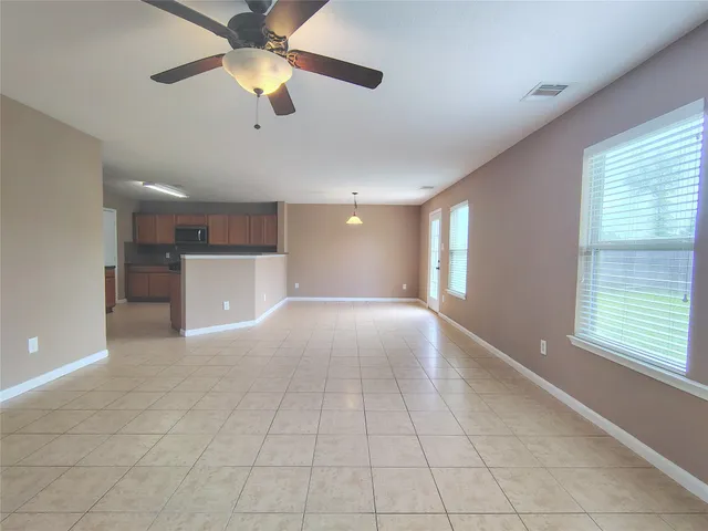 a view of kitchen and windows