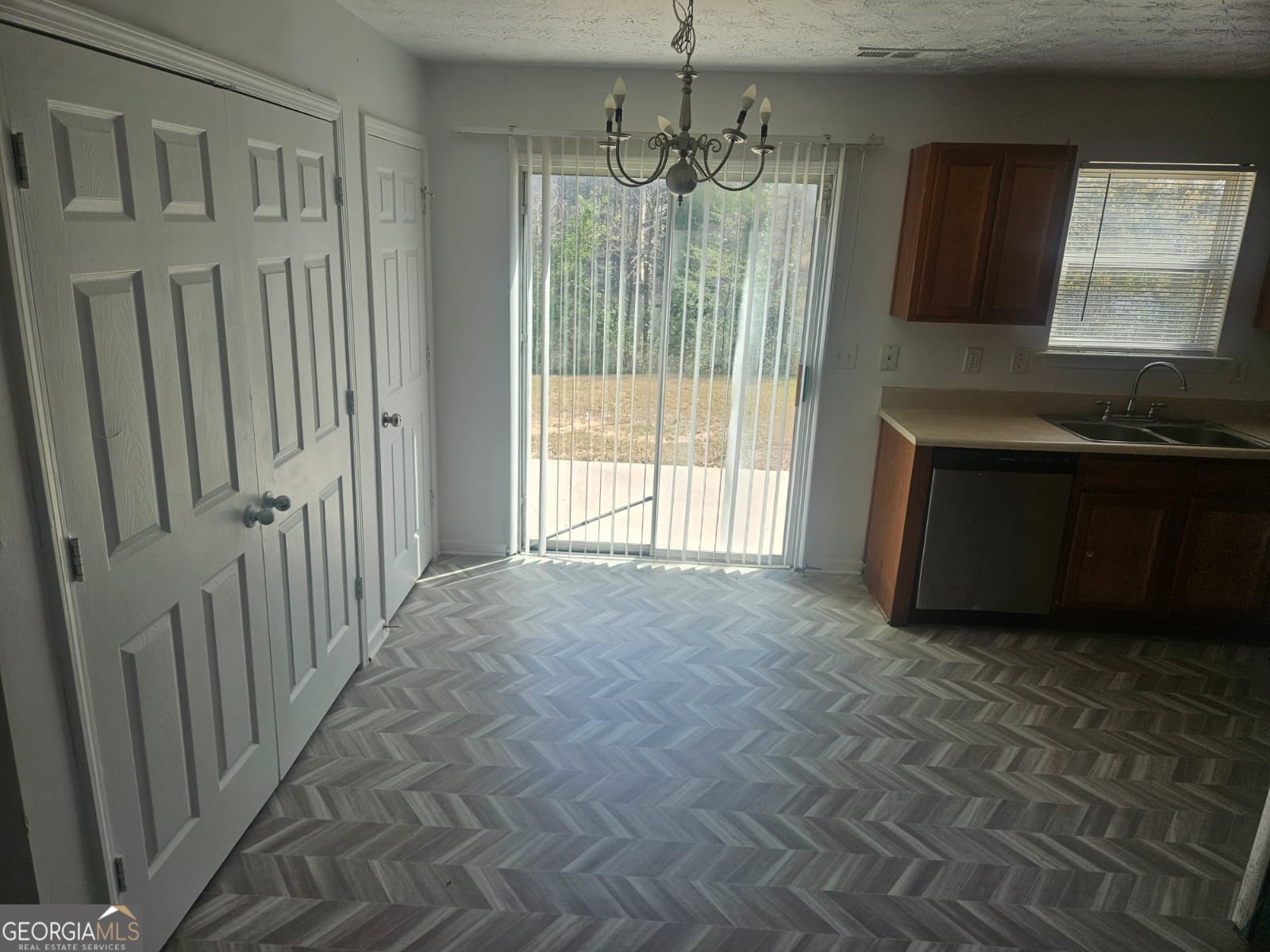 9432 Lakeview Road, Unit 53 Union City, GA 30291 - Photo 3 of 10 a view of an empty room with a window
