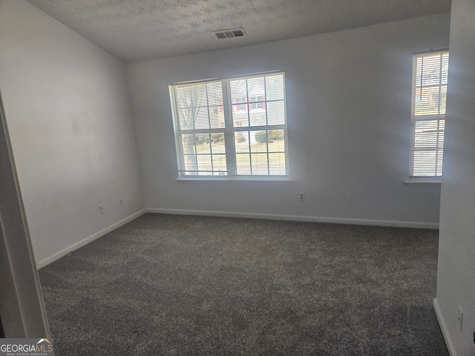 9432 Lakeview Road, Unit 53 Union City, GA 30291 - Photo 5 of 10 an empty room with a window