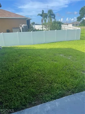 a view of a livingroom with shelves