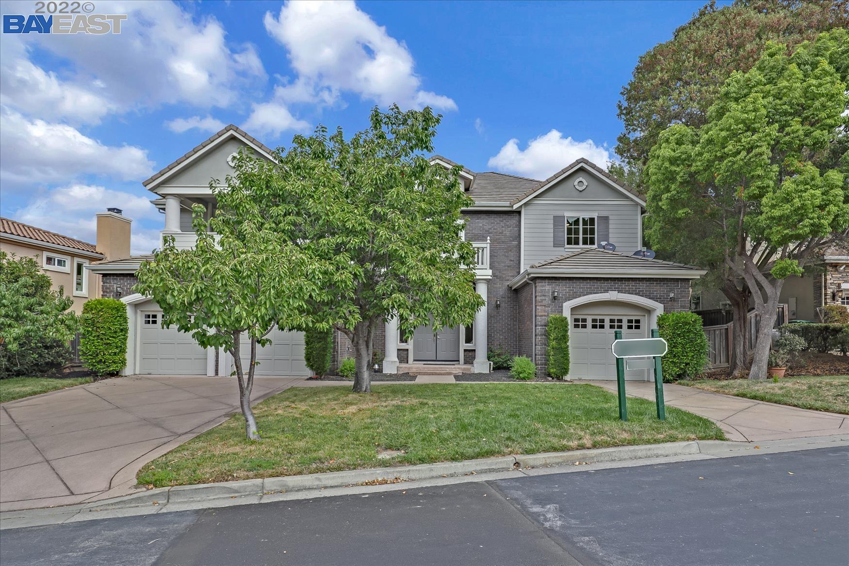 149 Lyndhurst Place San Ramon, CA 94583 - Photo 1 of 1 a front view of a house with a yard and garage