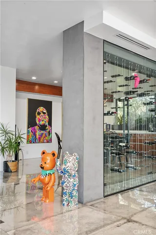a kitchen with stainless steel appliances granite countertop a stove and a refrigerator