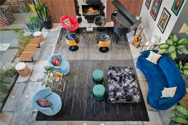 a kitchen with stainless steel appliances kitchen island granite countertop a sink and cabinets