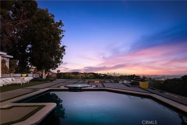 a view of a patio with swimming pool