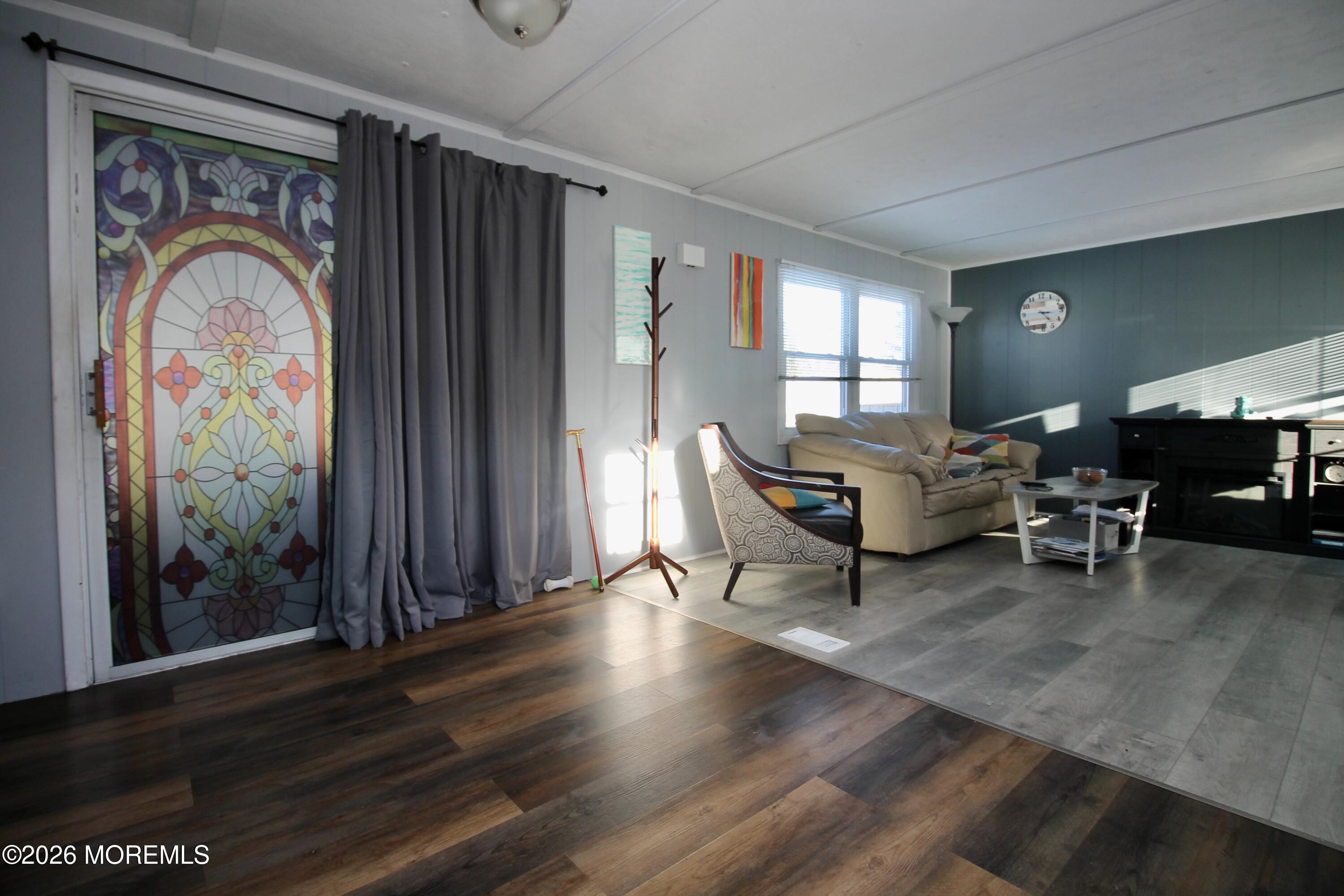 509 Rosalind Road Freehold, NJ 07728 - Photo 12 of 24 a living room with furniture and a window