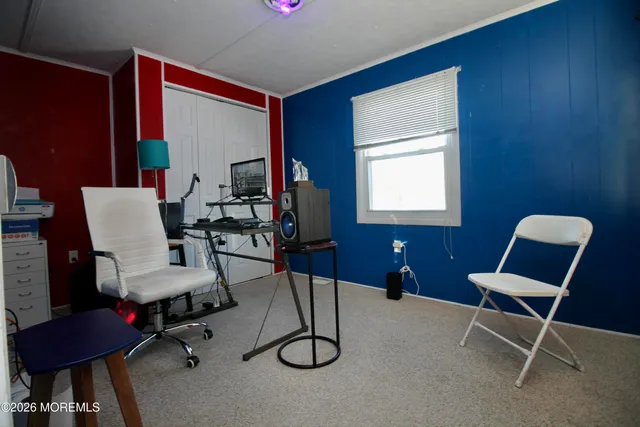 a room with furniture and air hockey table