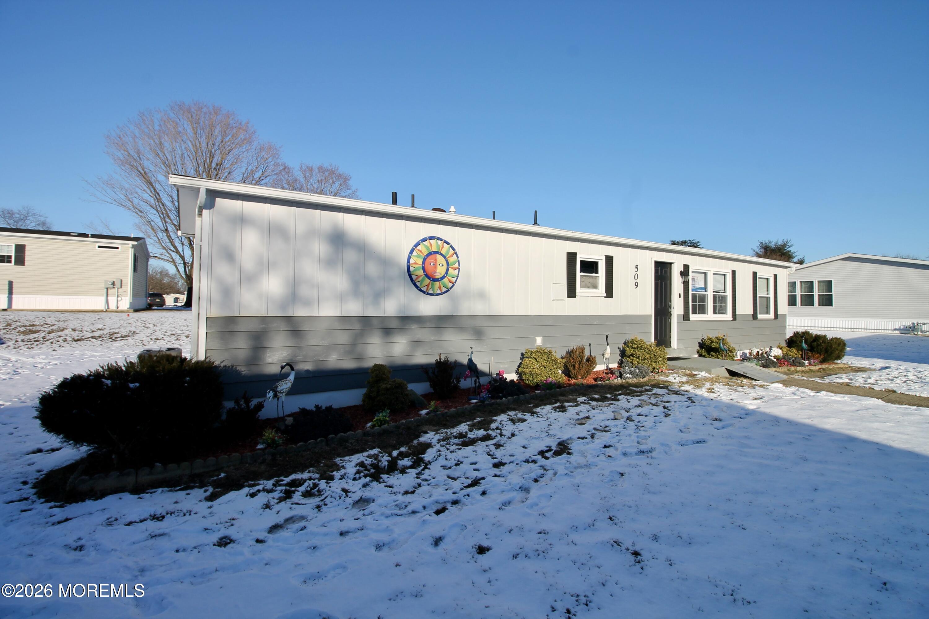 509 Rosalind Road Freehold, NJ 07728 - Photo 3 of 24 a front view of a house with a yard