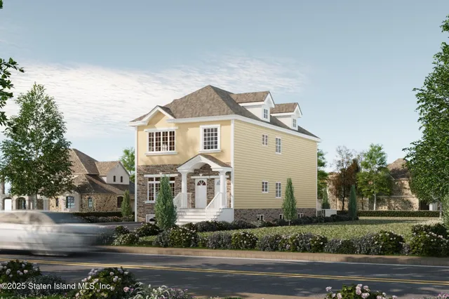 front view of a house with a yard