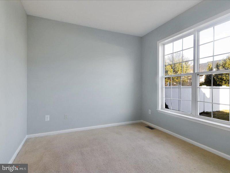 77 Cayuga Road Bordentown, NJ 08505 - Photo 15 of 37 an empty room with a window