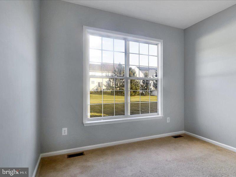 77 Cayuga Road Bordentown, NJ 08505 - Photo 16 of 37 an empty room with a window