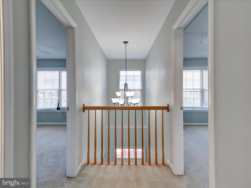 77 Cayuga Road Bordentown, NJ 08505 - Photo 19 of 37 a view of hallway with windows