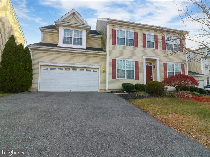 77 Cayuga Road Bordentown, NJ 08505 - Photo 2 of 37 a view of an house with backyard and garden