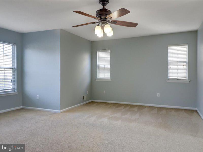 77 Cayuga Road Bordentown, NJ 08505 - Photo 21 of 37 a view of an empty room with a window