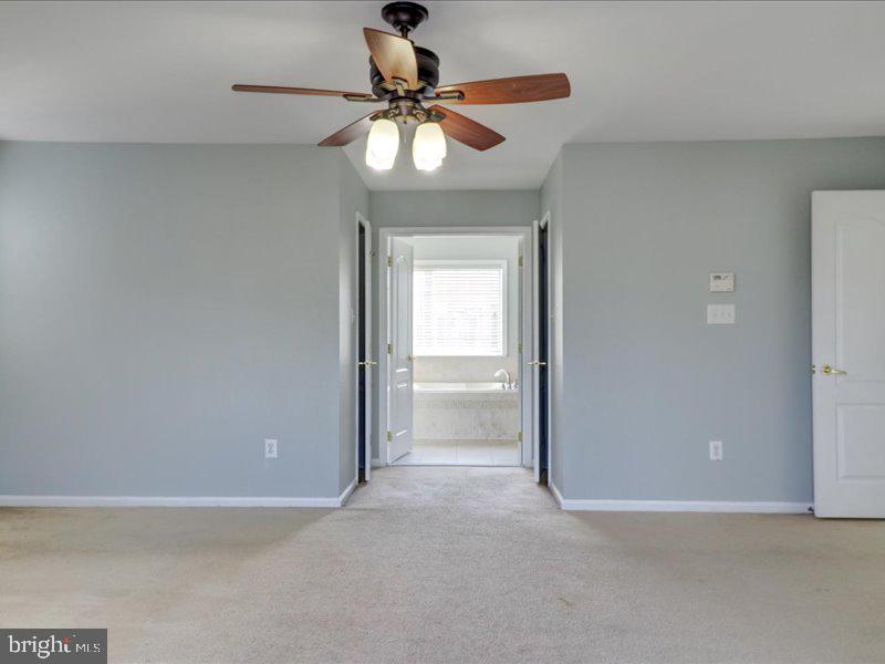 77 Cayuga Road Bordentown, NJ 08505 - Photo 22 of 37 a view of an empty room and window