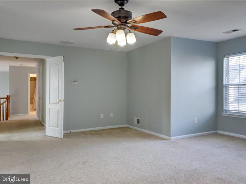 77 Cayuga Road Bordentown, NJ 08505 - Photo 23 of 37 a view of an empty room with a window