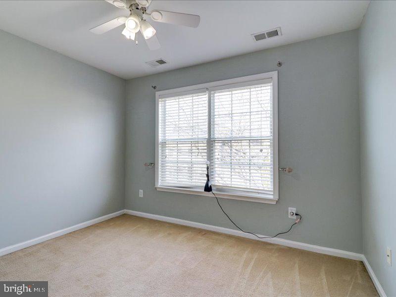 77 Cayuga Road Bordentown, NJ 08505 - Photo 33 of 37 a view of an empty room with a window