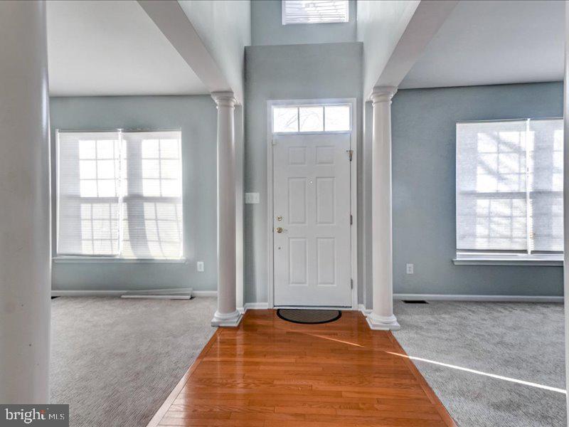 77 Cayuga Road Bordentown, NJ 08505 - Photo 7 of 37 a bedroom with a bed and a window