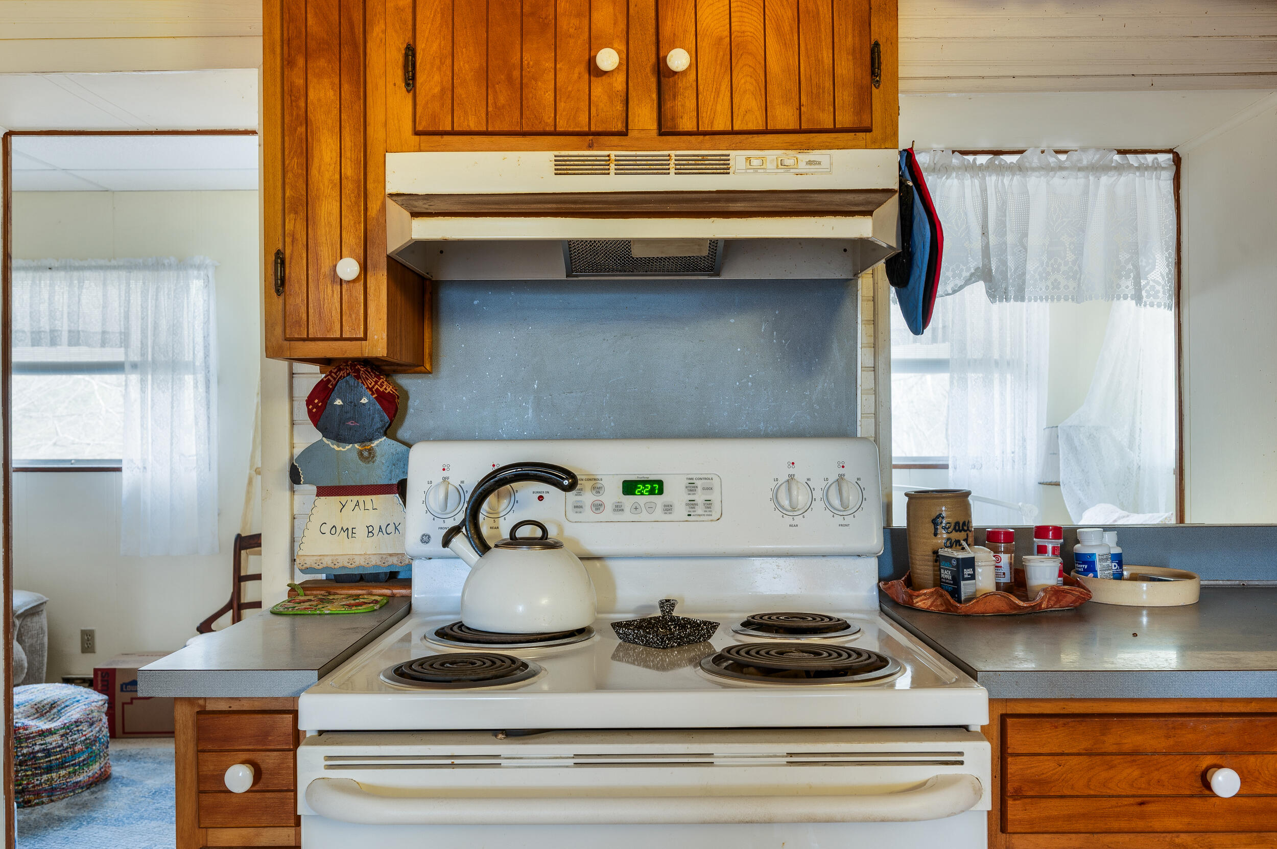 1374 Moccasin Road Thaxton, VA 24174 - Photo 22 of 81 a kitchen with a stove and cabinets