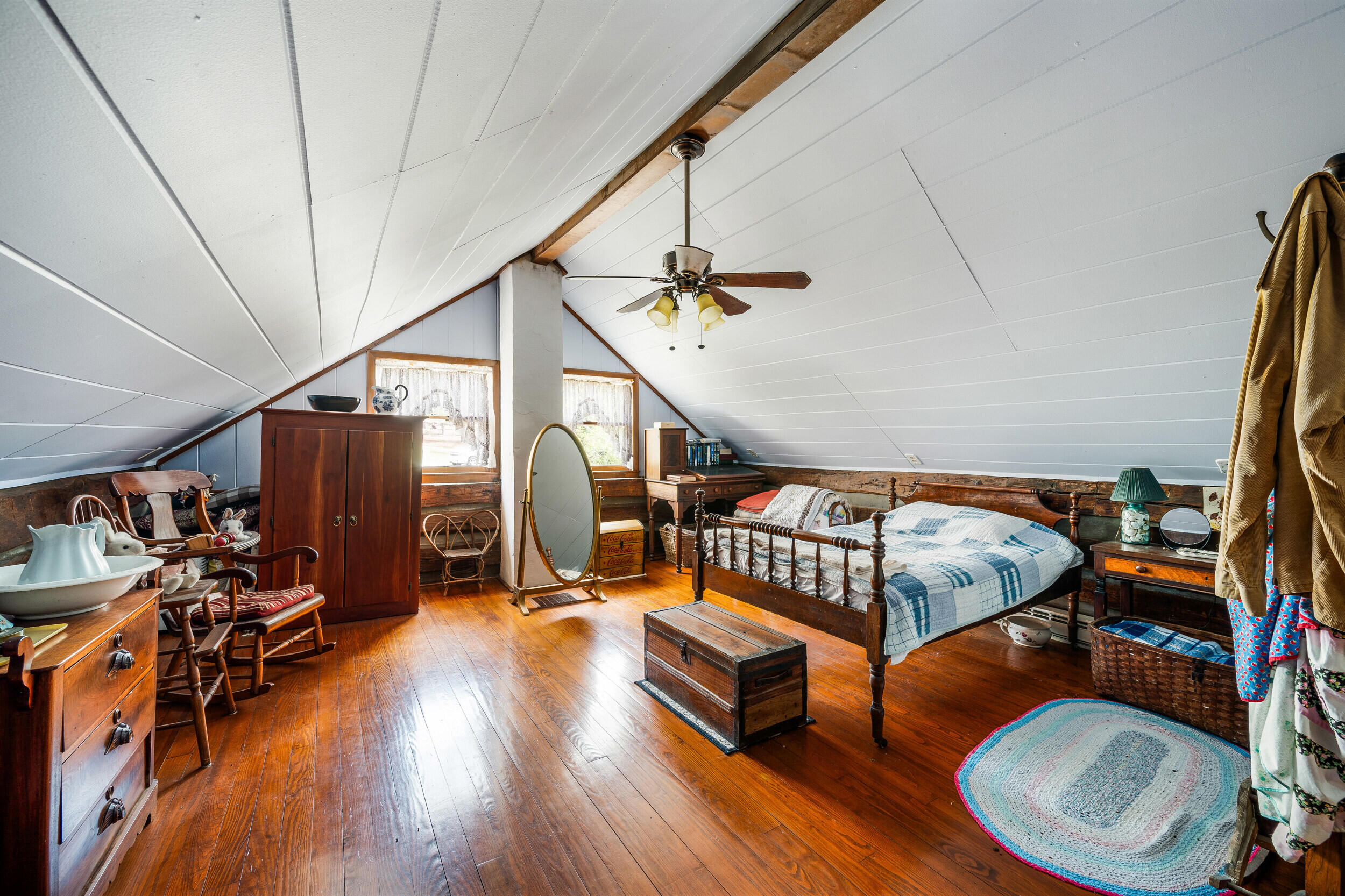 1374 Moccasin Road Thaxton, VA 24174 - Photo 31 of 81 a bedroom with furniture and a wooden floor