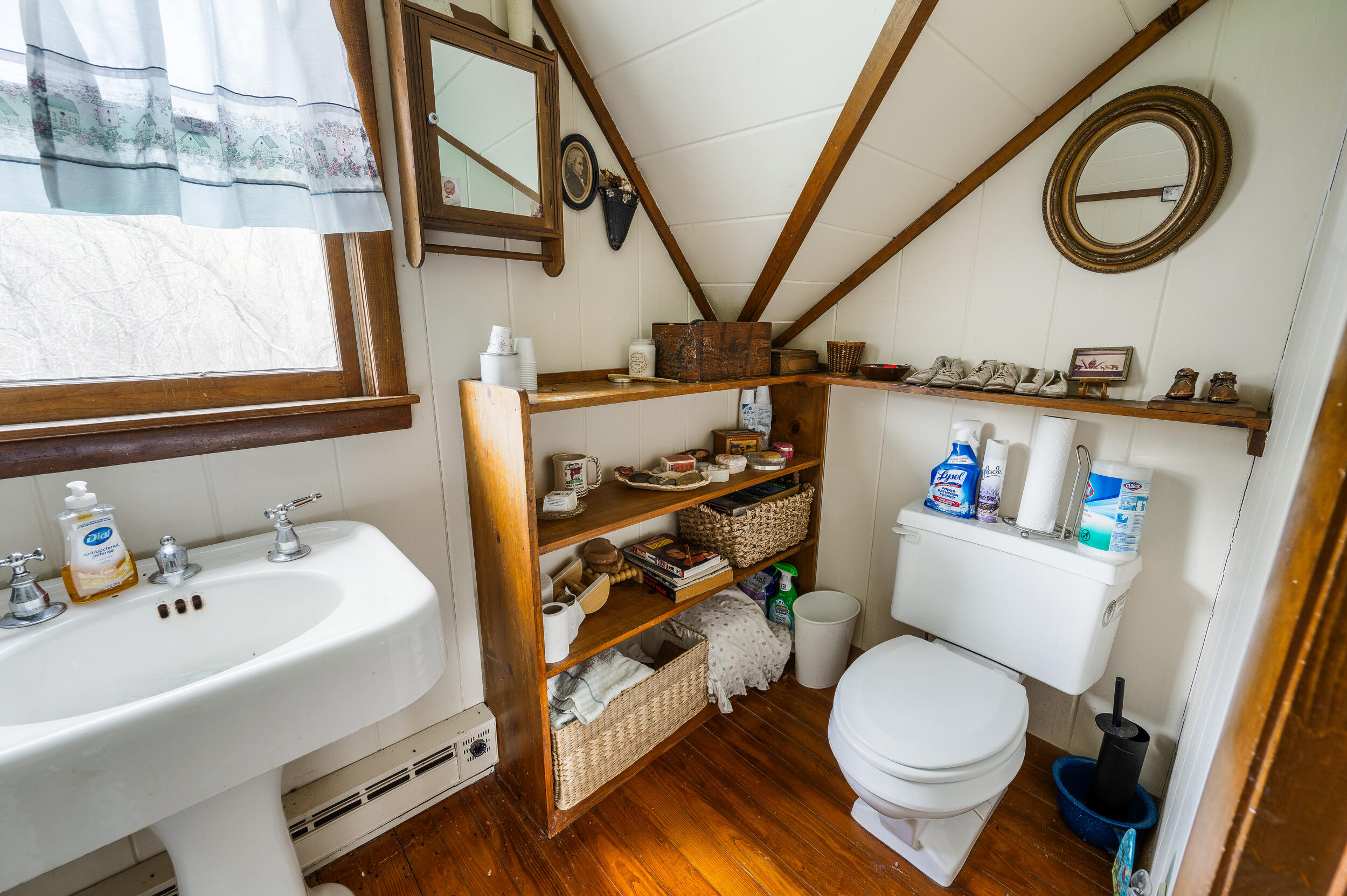 1374 Moccasin Road Thaxton, VA 24174 - Photo 36 of 81 a white toilet sitting next to a bathroom sink