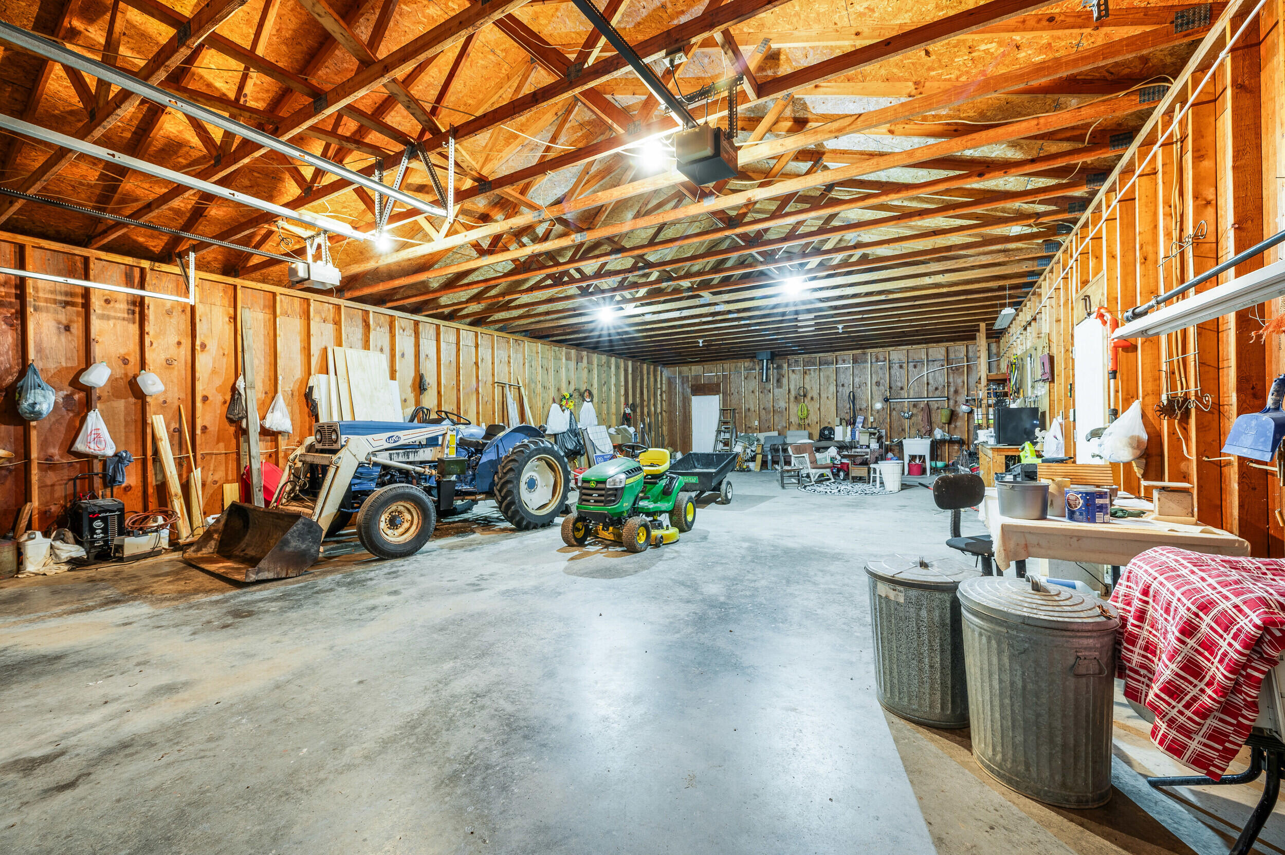 1374 Moccasin Road Thaxton, VA 24174 - Photo 47 of 81 a view of a garage with a bike and a roof