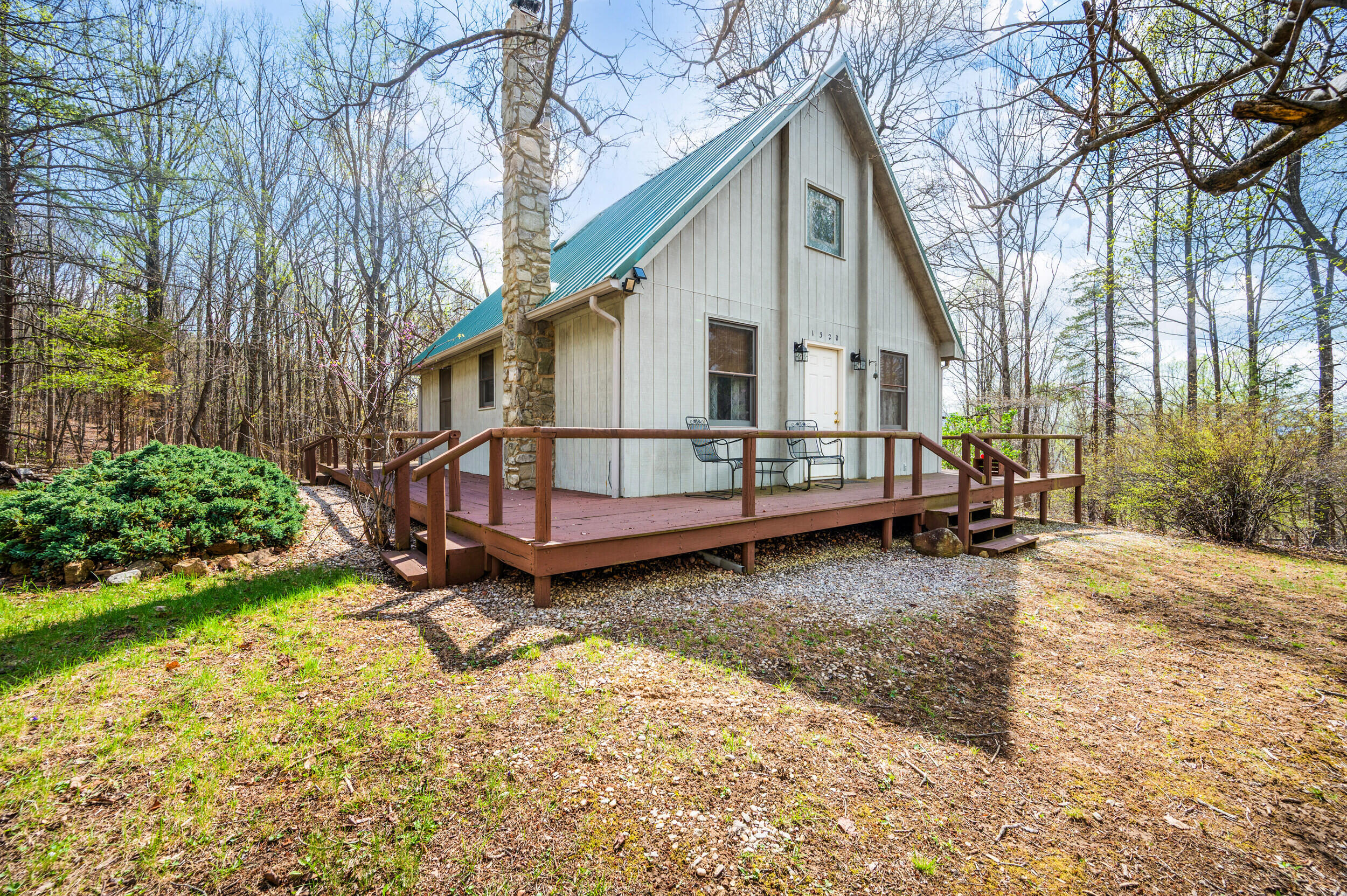 1374 Moccasin Road Thaxton, VA 24174 - Photo 50 of 81 a view of a house with backyard and sitting area