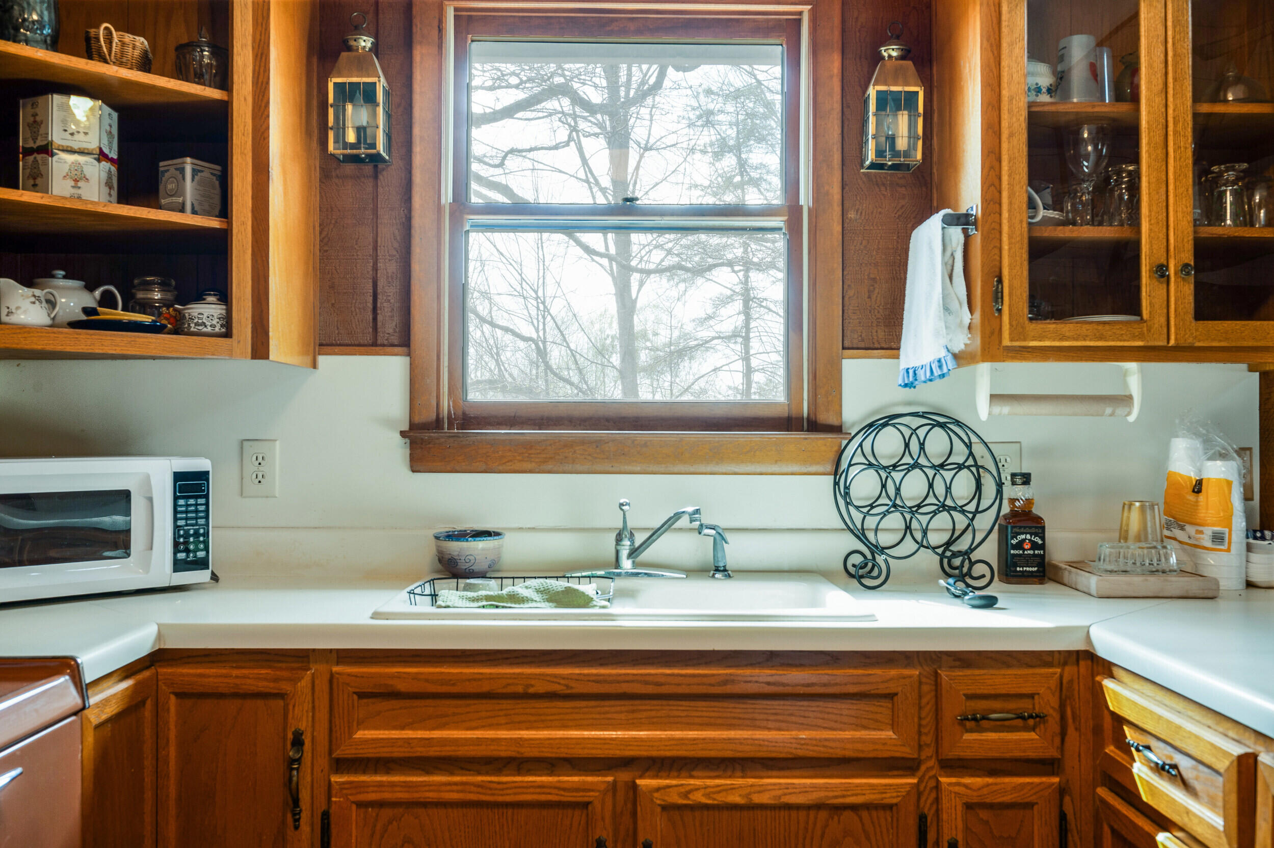 1374 Moccasin Road Thaxton, VA 24174 - Photo 57 of 81 a kitchen with stainless steel appliances granite countertop a sink and a window