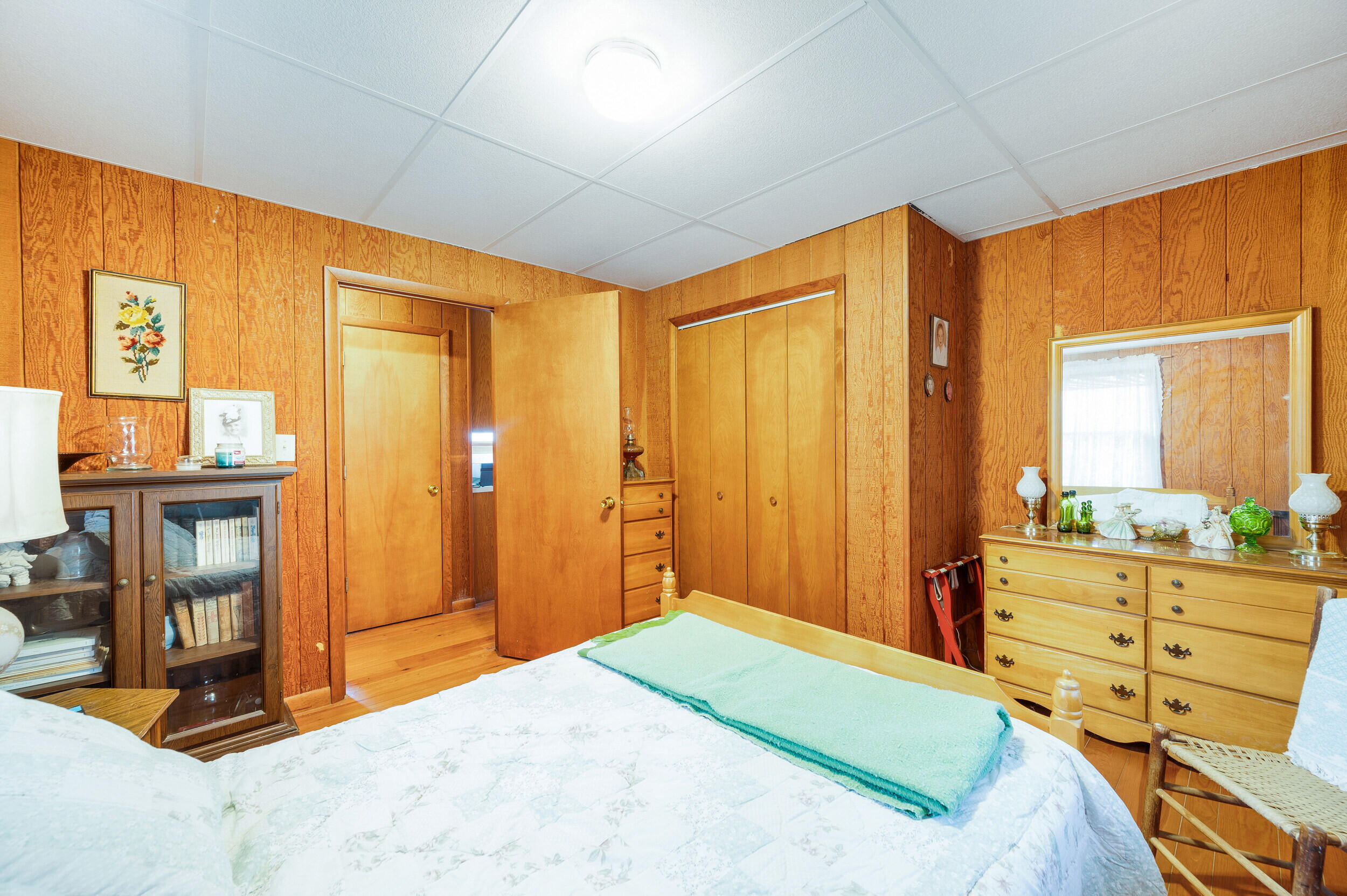 1374 Moccasin Road Thaxton, VA 24174 - Photo 61 of 81 a bedroom with a bed and large windows