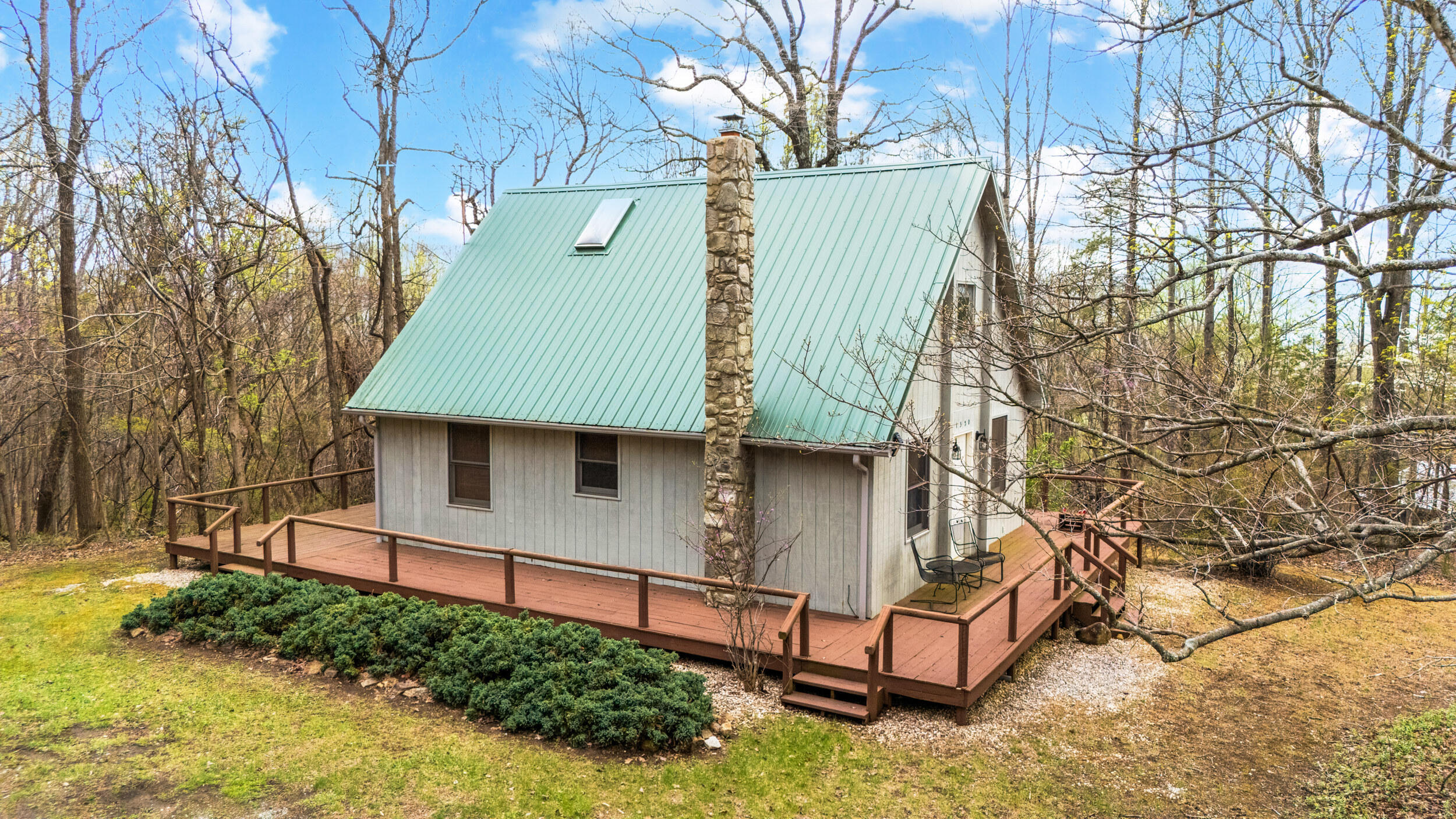 1374 Moccasin Road Thaxton, VA 24174 - Photo 70 of 81 a house with trees in front of it