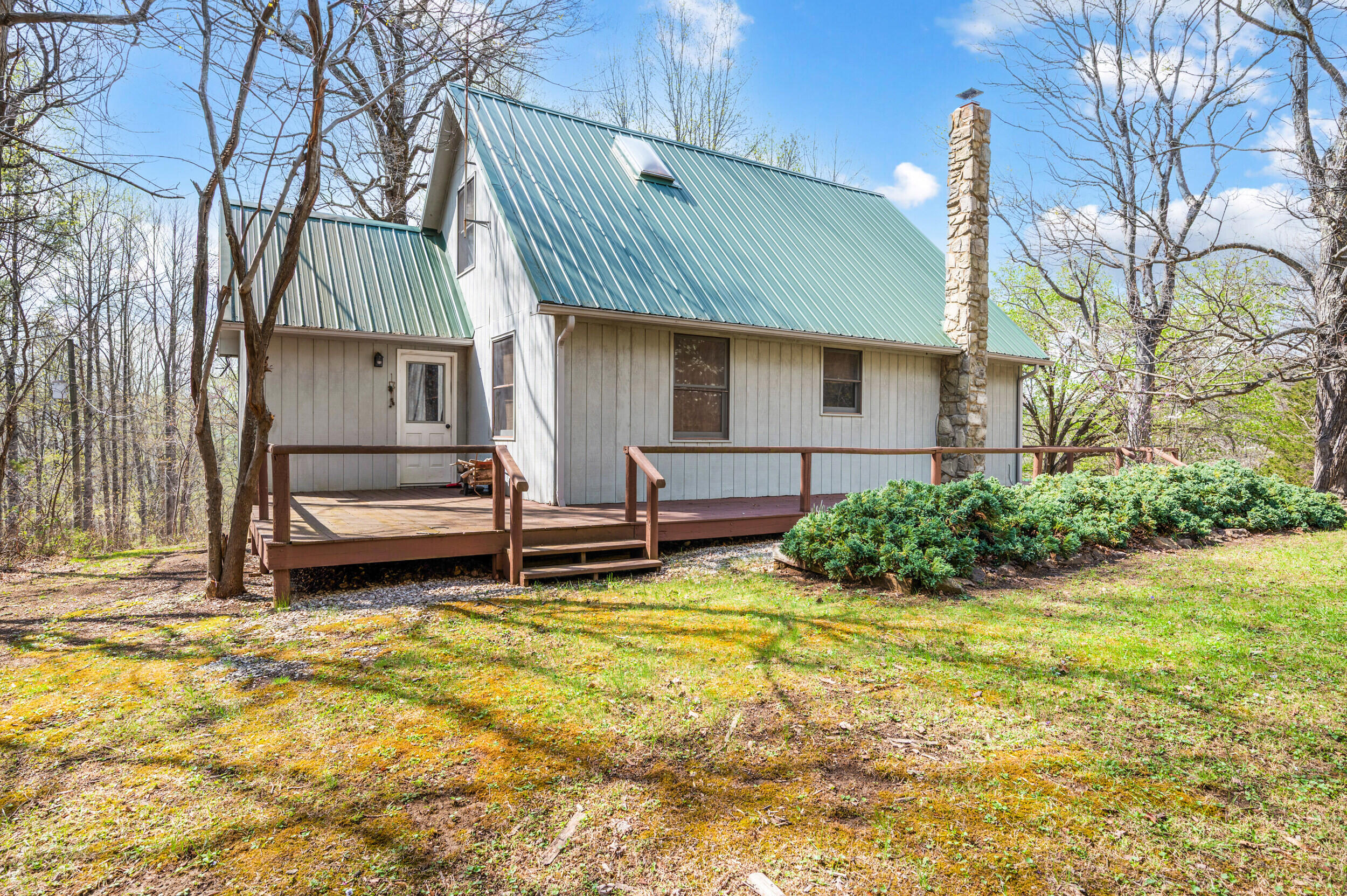 1374 Moccasin Road Thaxton, VA 24174 - Photo 74 of 81 a view of a house with a yard patio and fire pit