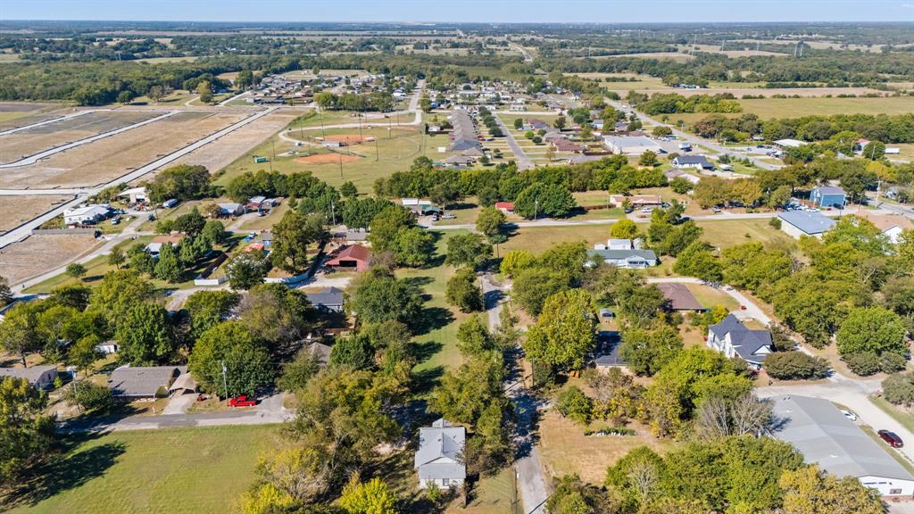 301 South Morrow Street Blue Ridge, TX 75424 - Photo 28 of 30 an aerial view of residential houses with outdoor space