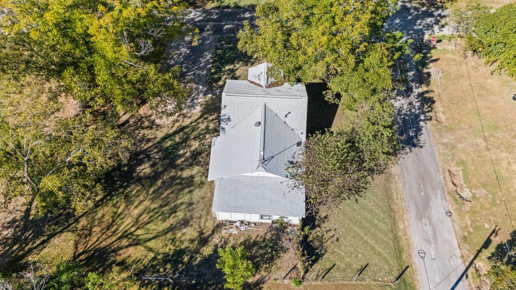 301 South Morrow Street Blue Ridge, TX 75424 - Photo 30 of 30 an aerial view of a house with a yard