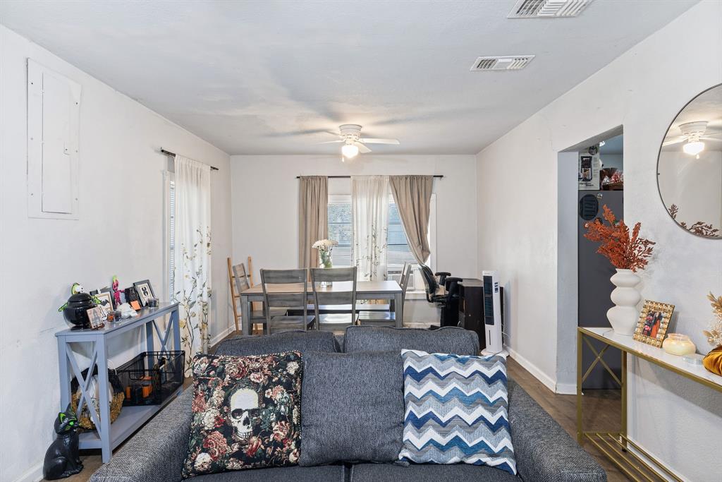 301 South Morrow Street Blue Ridge, TX 75424 - Photo 8 of 30 a living room with furniture and a large window