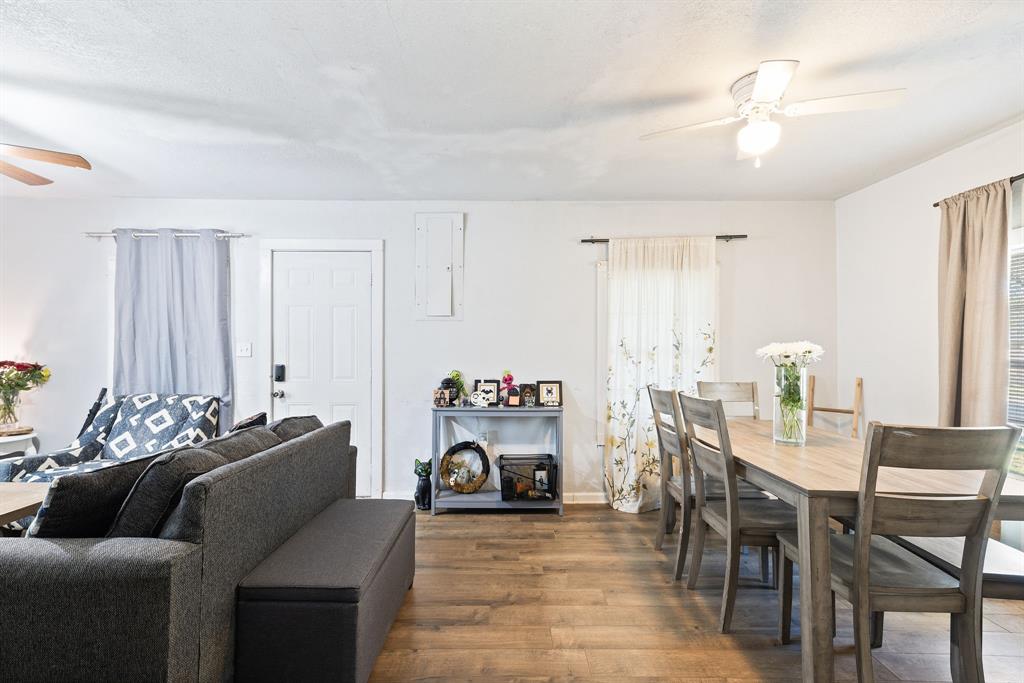 301 South Morrow Street Blue Ridge, TX 75424 - Photo 10 of 30 a living room with furniture and a fireplace