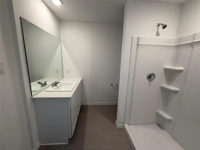 a utility room with cabinets