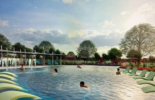 a view of swimming pool with chairs