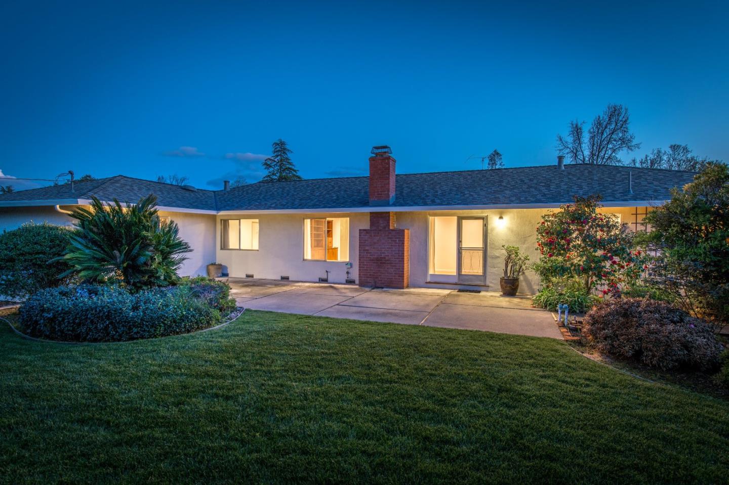 20249 Edinburgh Drive Saratoga, CA 95070 - Photo 26 of 32 a view of house with backyard and garden