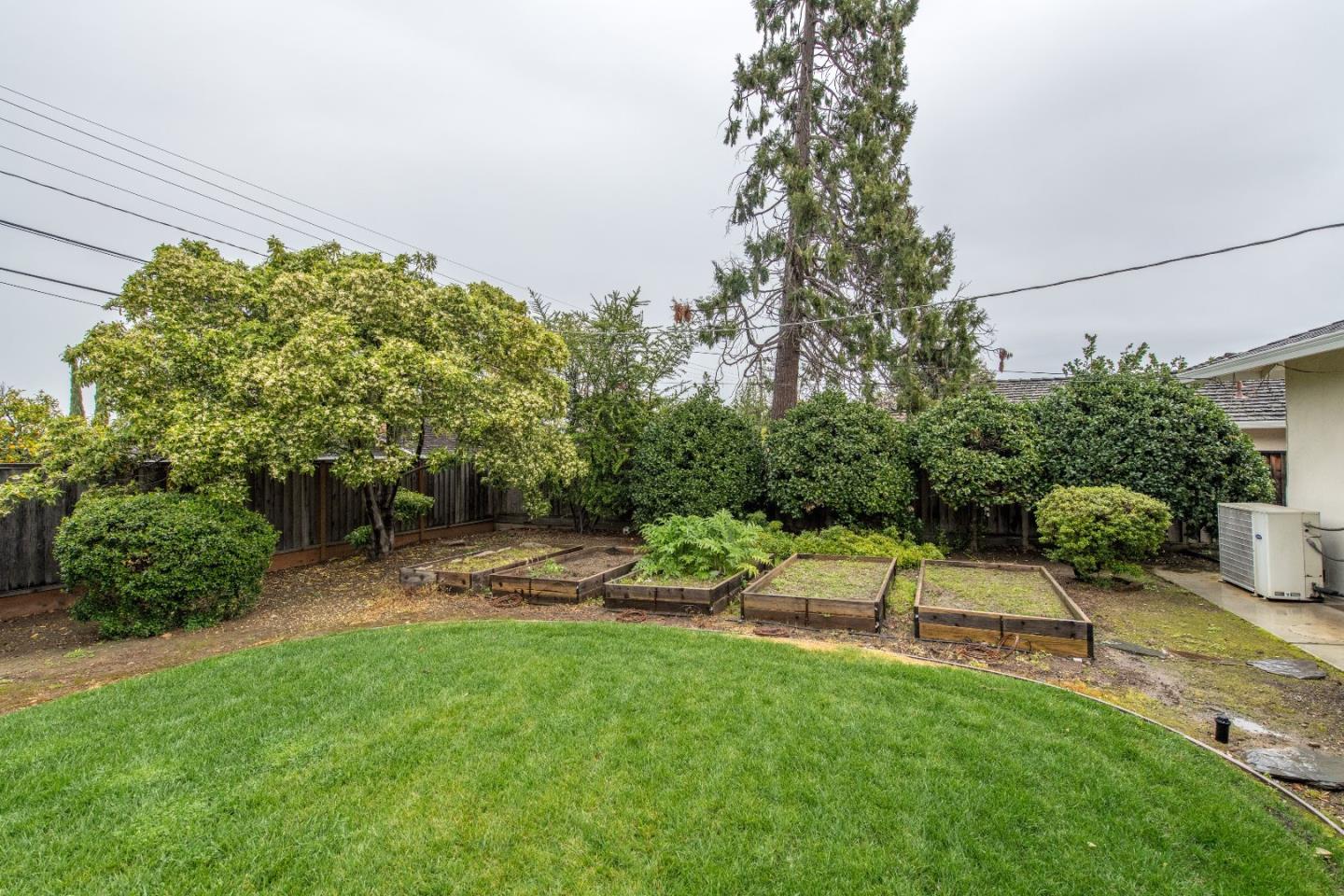 20249 Edinburgh Drive Saratoga, CA 95070 - Photo 28 of 32 a view of backyard with swimming pool and patio