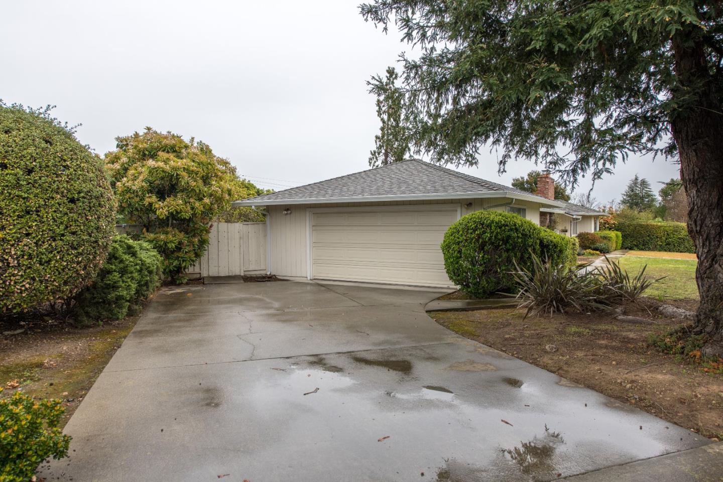 20249 Edinburgh Drive Saratoga, CA 95070 - Photo 32 of 32 a view of a backyard with plants and large trees