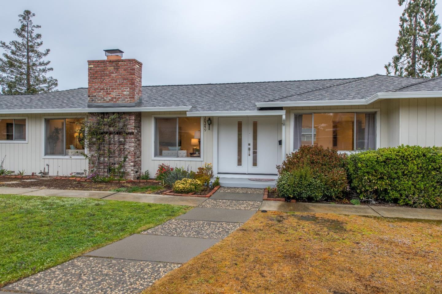 20249 Edinburgh Drive Saratoga, CA 95070 - Photo 4 of 32 front view of a house with a yard
