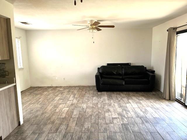 3510 Woodrow Street Selma, CA 93662 - Photo 2 of 4 a view of a livingroom with wooden floor