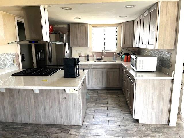 3510 Woodrow Street Selma, CA 93662 - Photo 4 of 4 a kitchen with kitchen island granite countertop a refrigerator and a sink